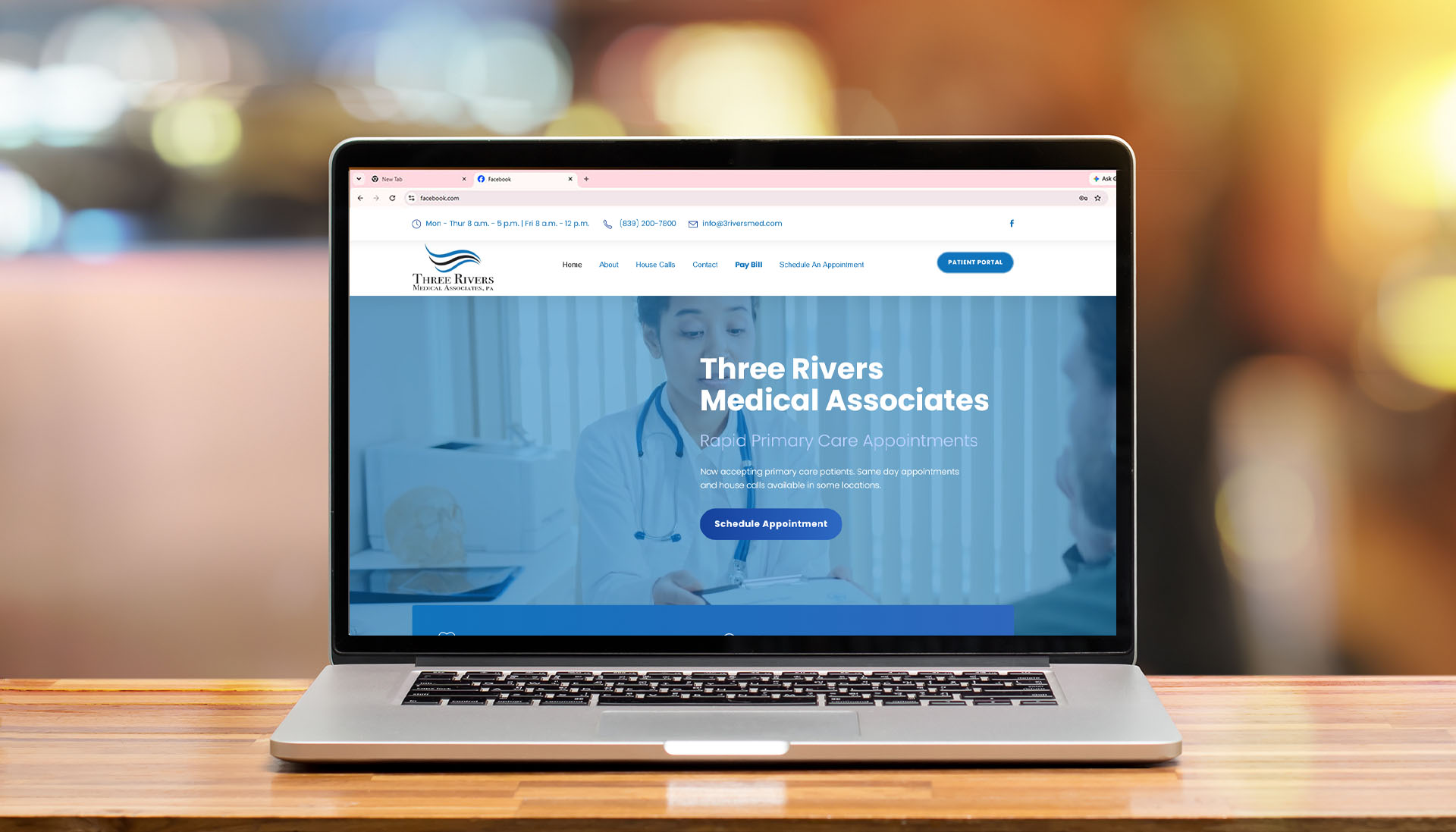 Three Rivers Medical Associates Website Three Rivers Medical Associates website homepage open on a laptop