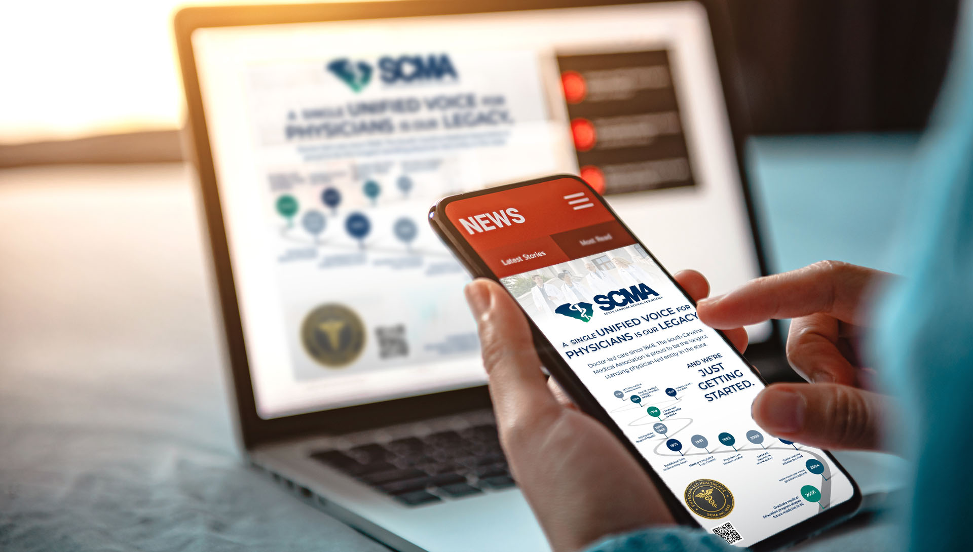 SCMA digital advertising shown on a laptop and smartphone